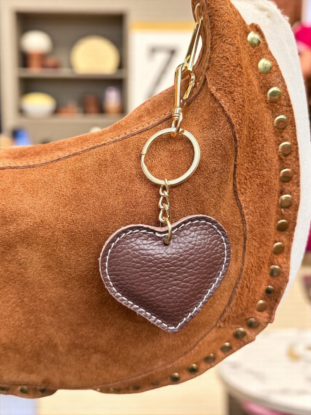 Charm para bolso de cuero con forma de corazón