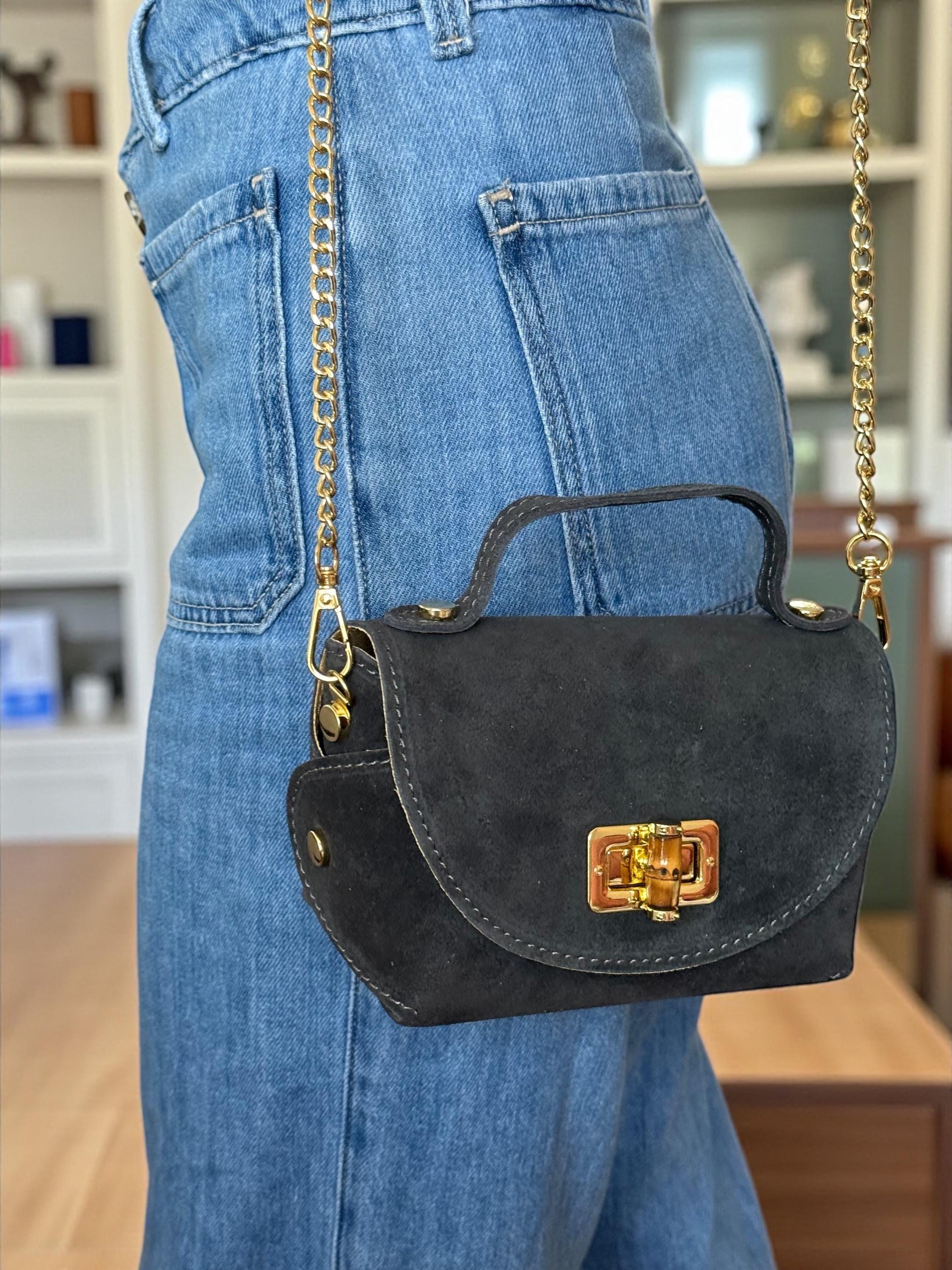 Mini bolso de ante o piel en tonos tierra