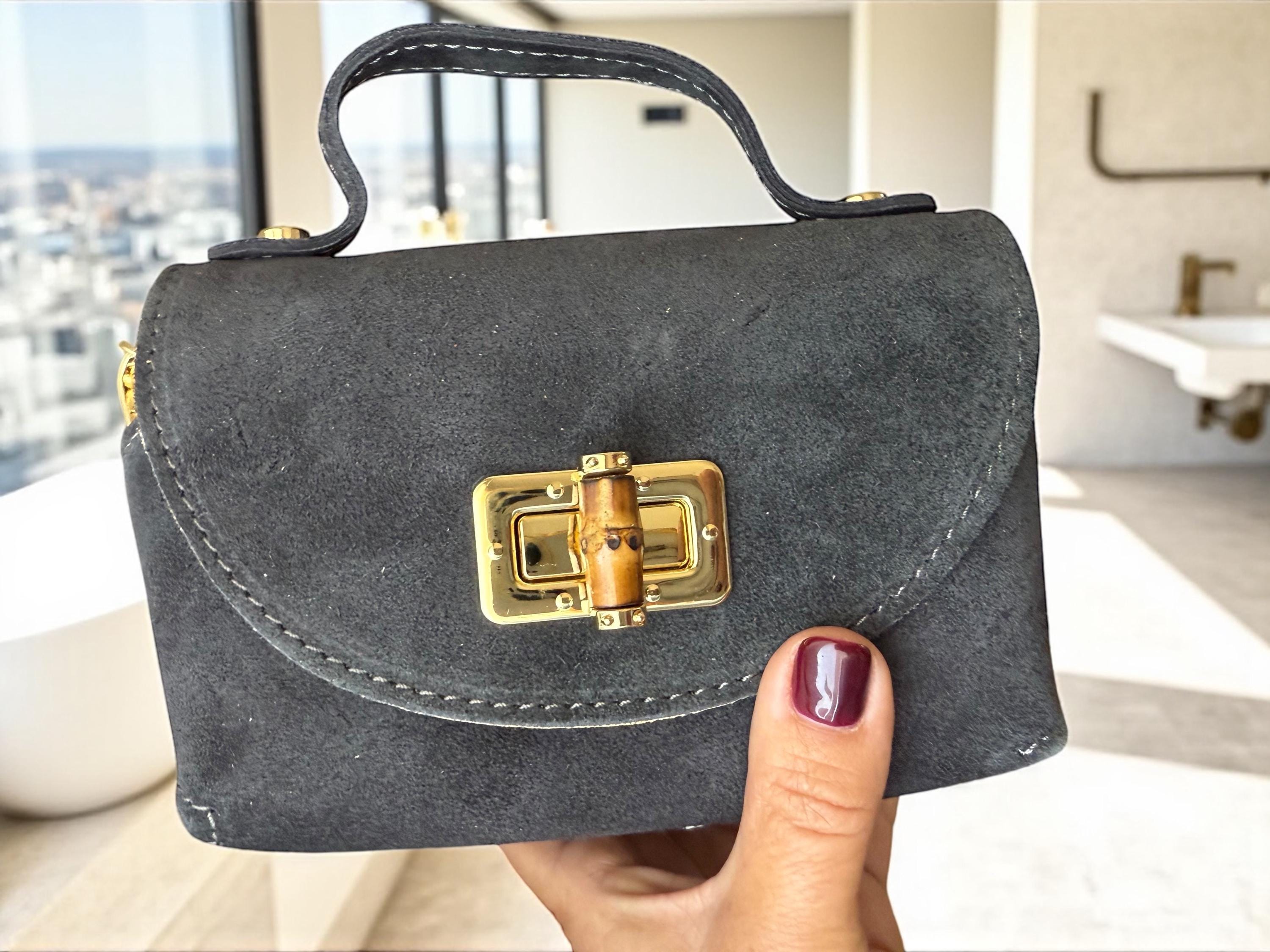 Mini bolso de ante o piel en tonos tierra