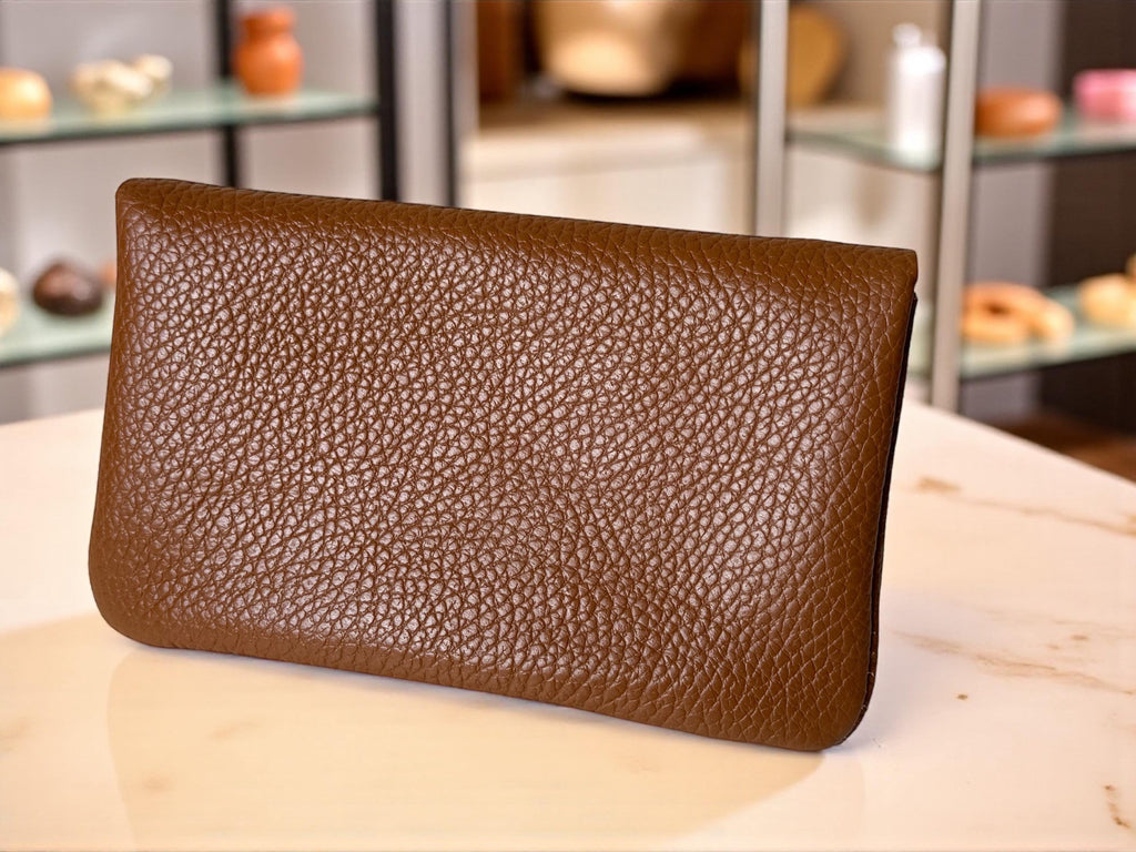 Cartera de piel en tonos cálidos tierra