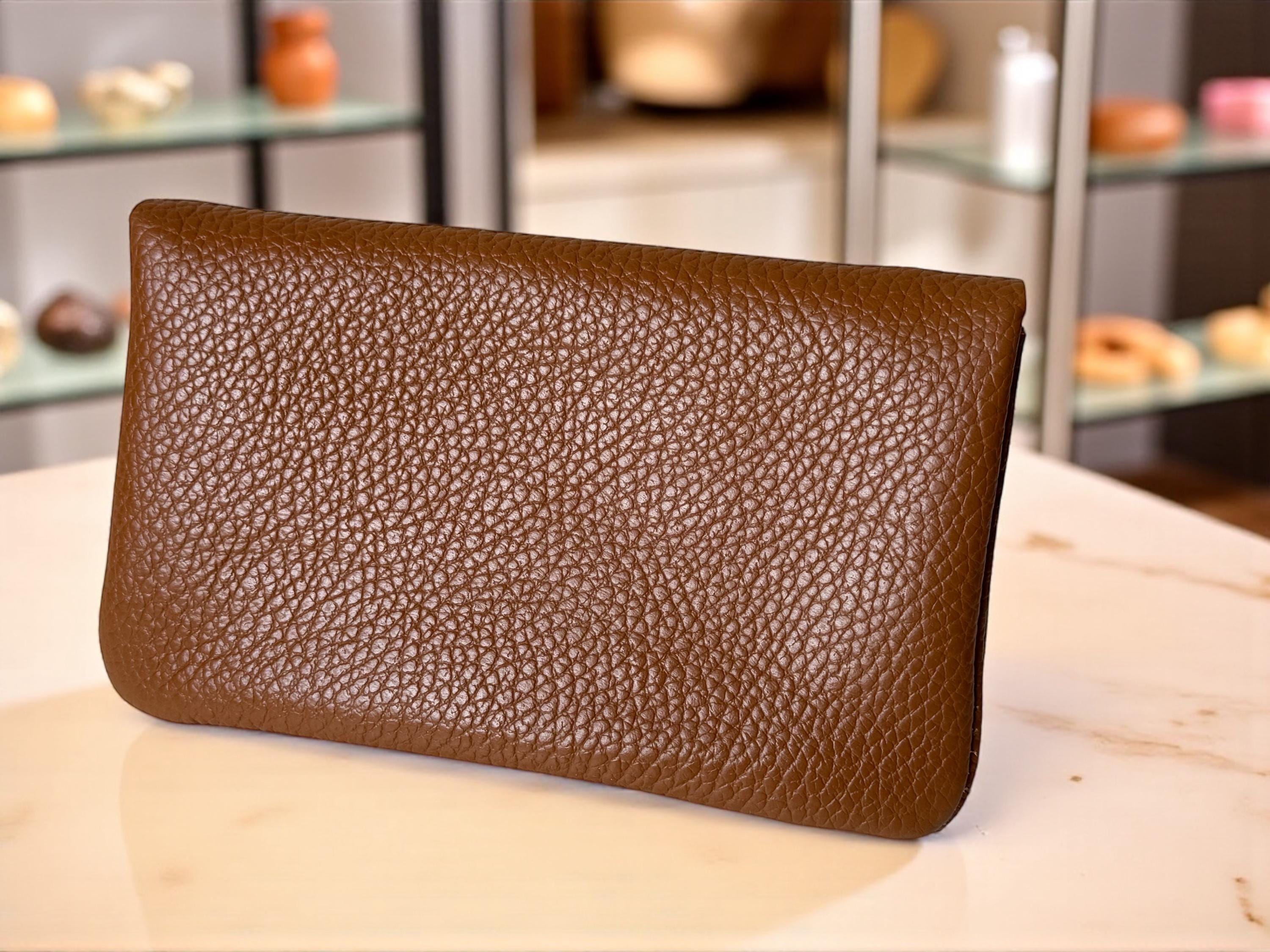 Cartera de piel en tonos cálidos tierra