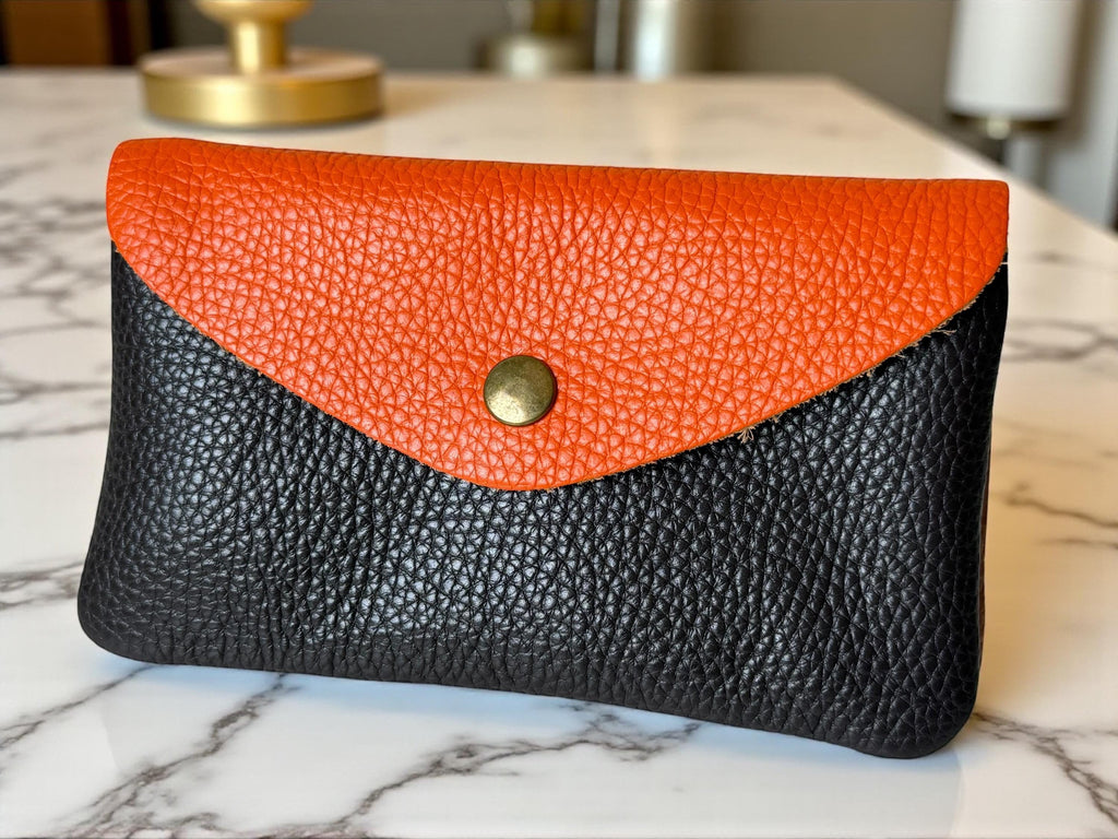 Cartera de piel en tonos cálidos tierra