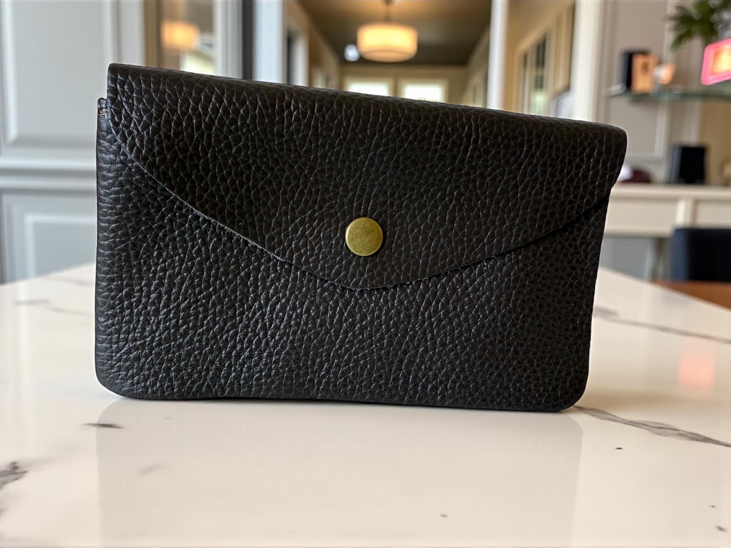 Cartera de piel en tonos cálidos tierra