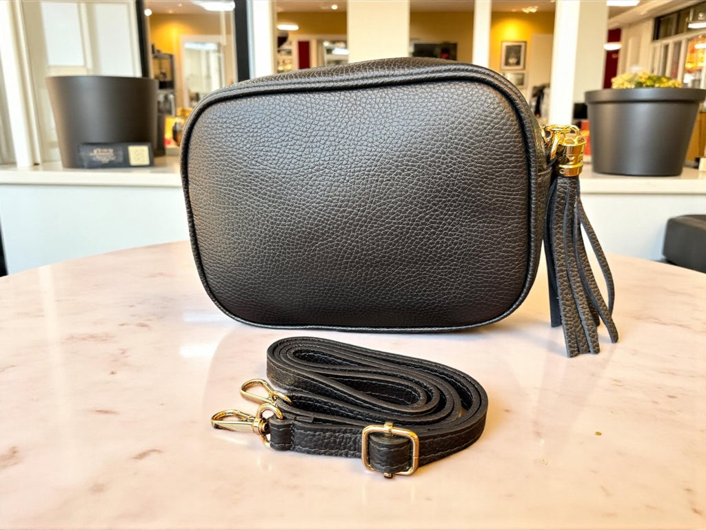 Bolso bandolera de piel granulada y pelo de poni con estampado de leopardo