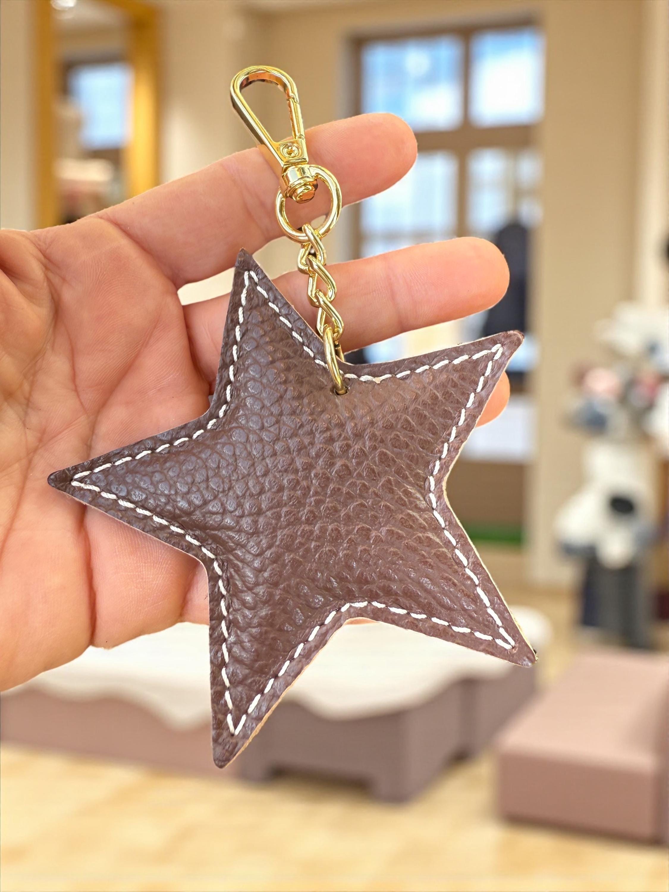 Adorno para bolso de piel auténtica en forma de estrella