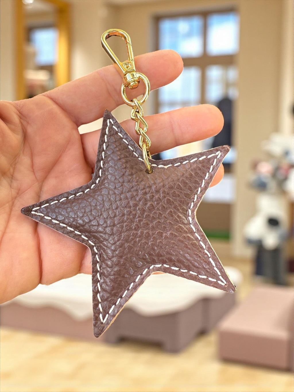 Charm para bolso de cuero con forma de estrella