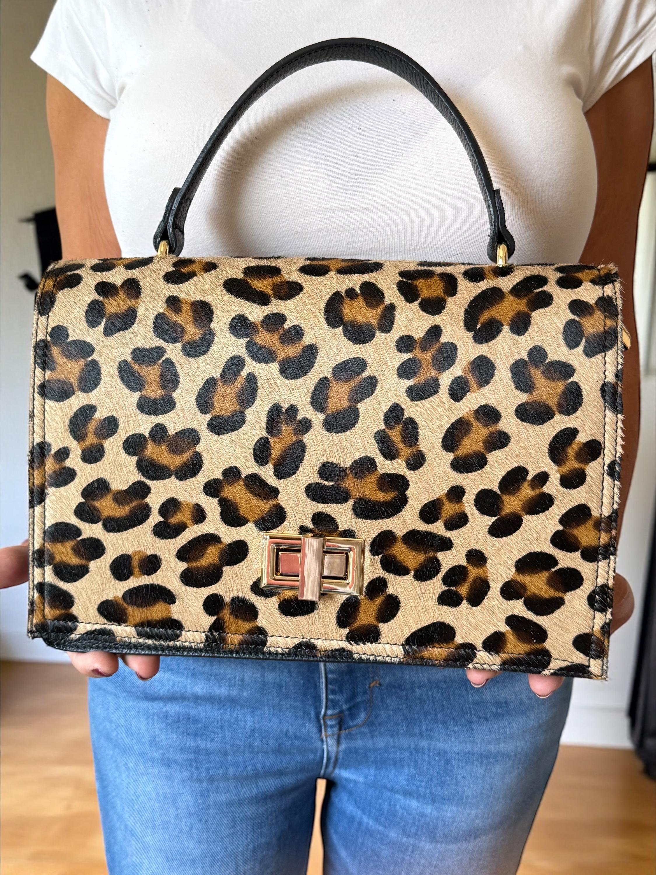 Bolso tipo cartera en pelo de poni con estampado de leopardo y cuero granulado auténtico