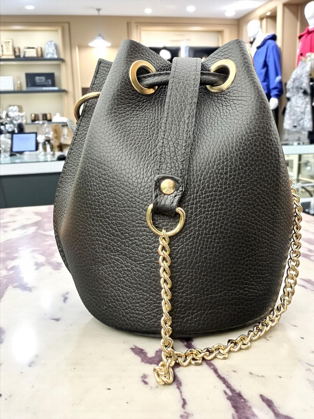 Cubo de piel granulada y pelo de poni de leopardo