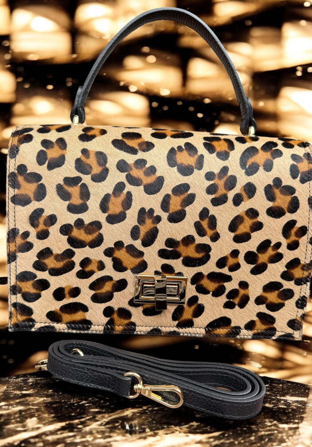 Bolso tipo cartera en pelo de poni con estampado de leopardo y cuero granulado auténtico
