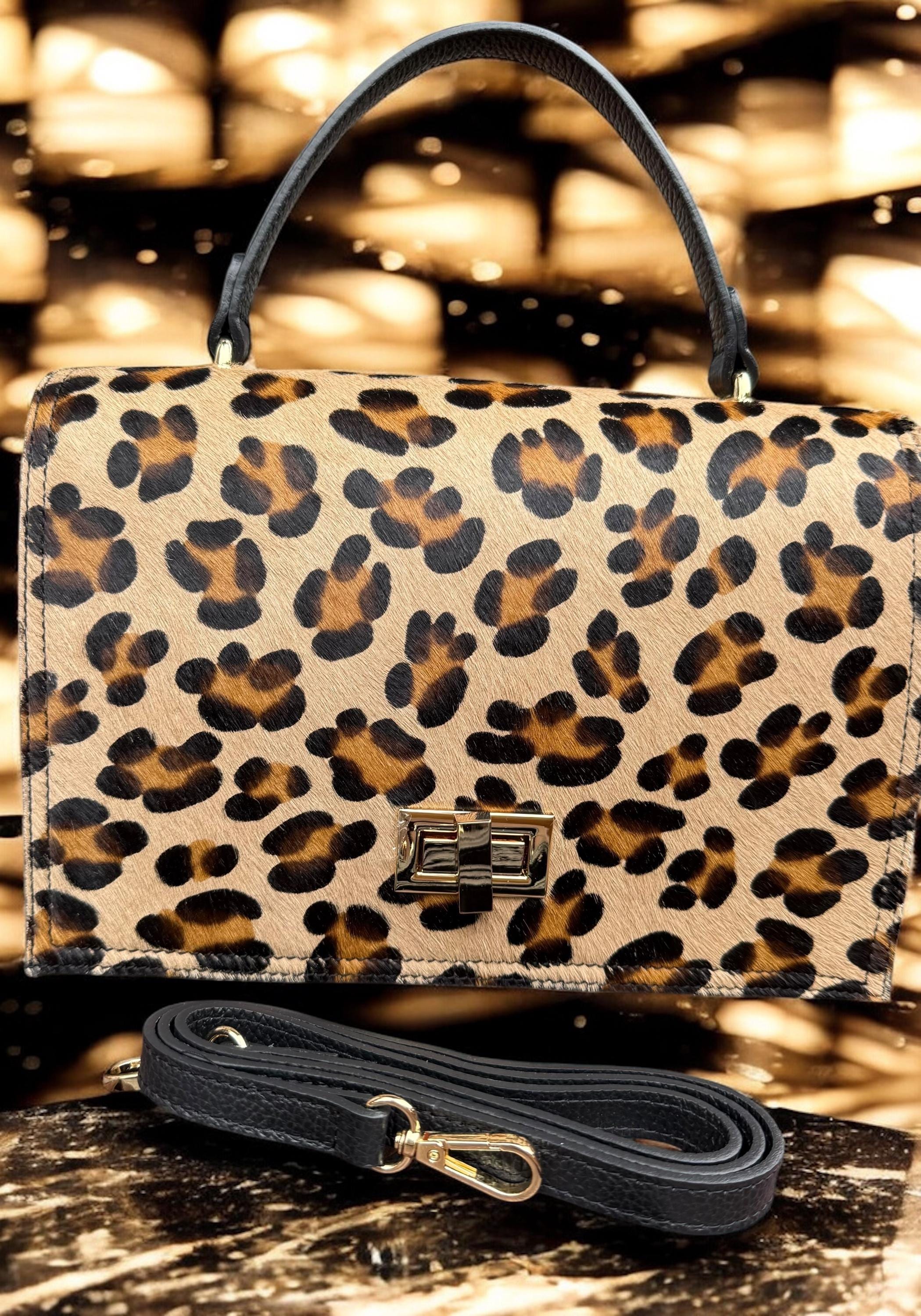 Bolso tipo cartera en pelo de poni con estampado de leopardo y cuero granulado auténtico