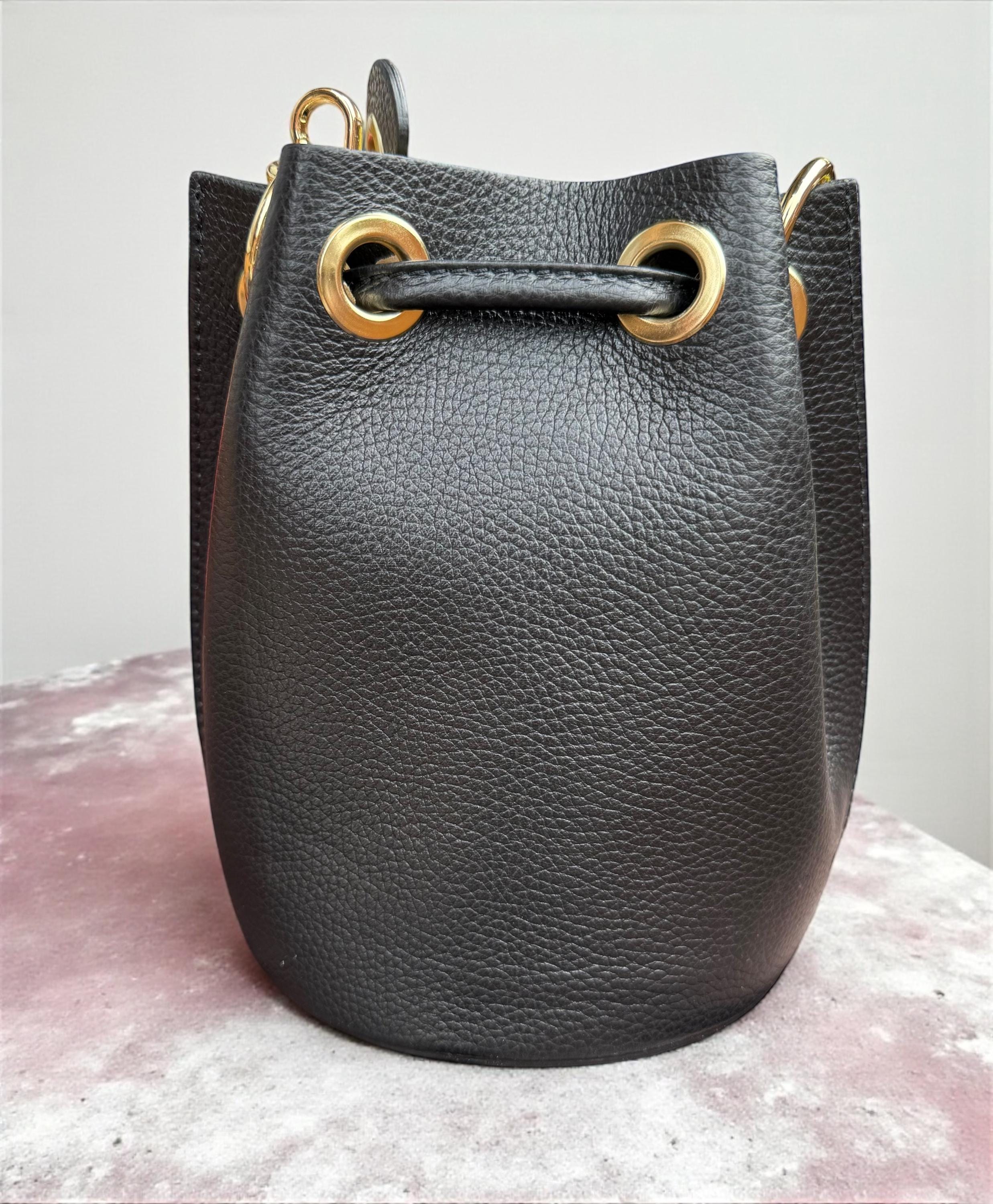 Cubo de piel granulada y pelo de poni de leopardo