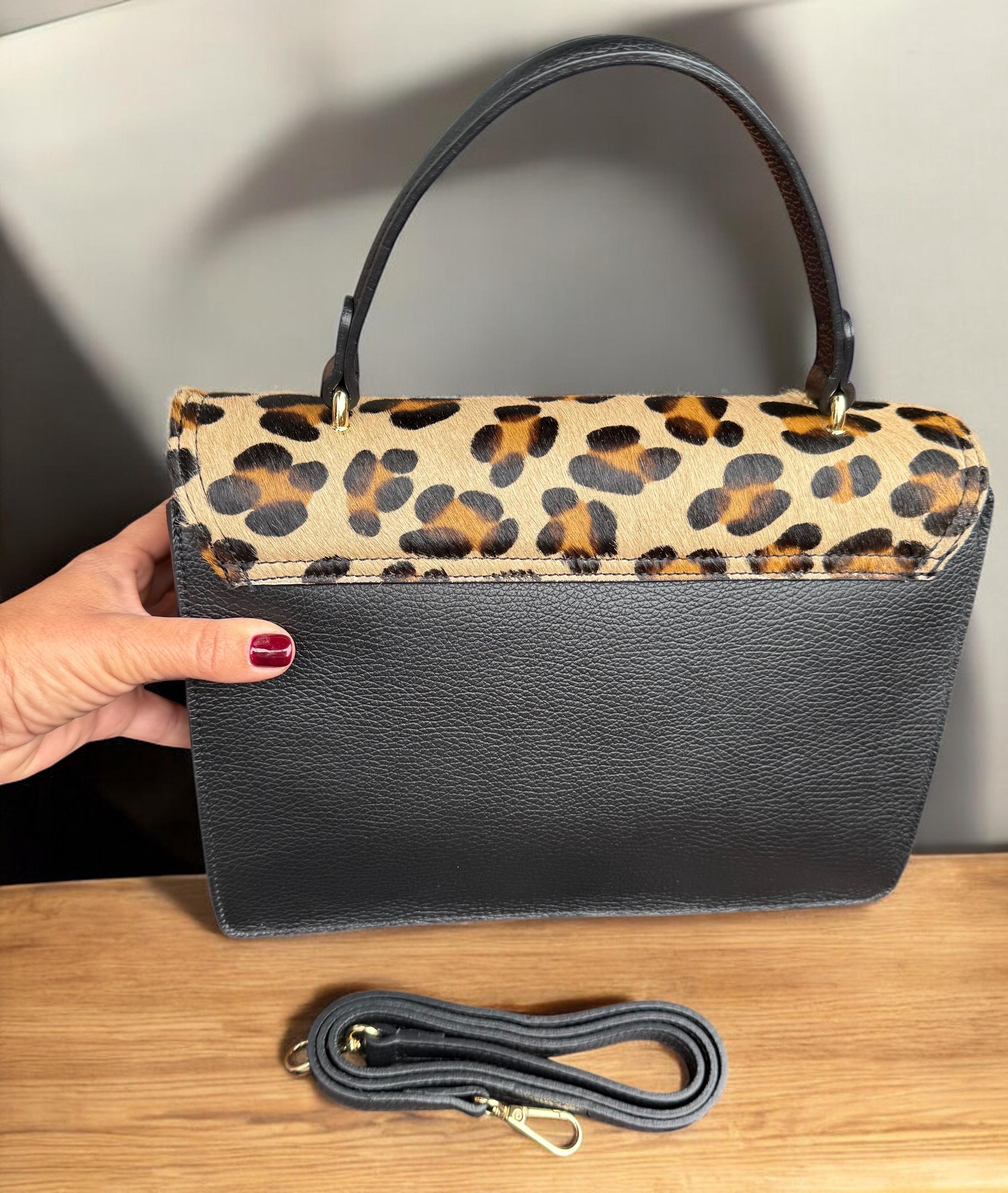 Bolso tipo cartera en pelo de poni con estampado de leopardo y cuero granulado auténtico