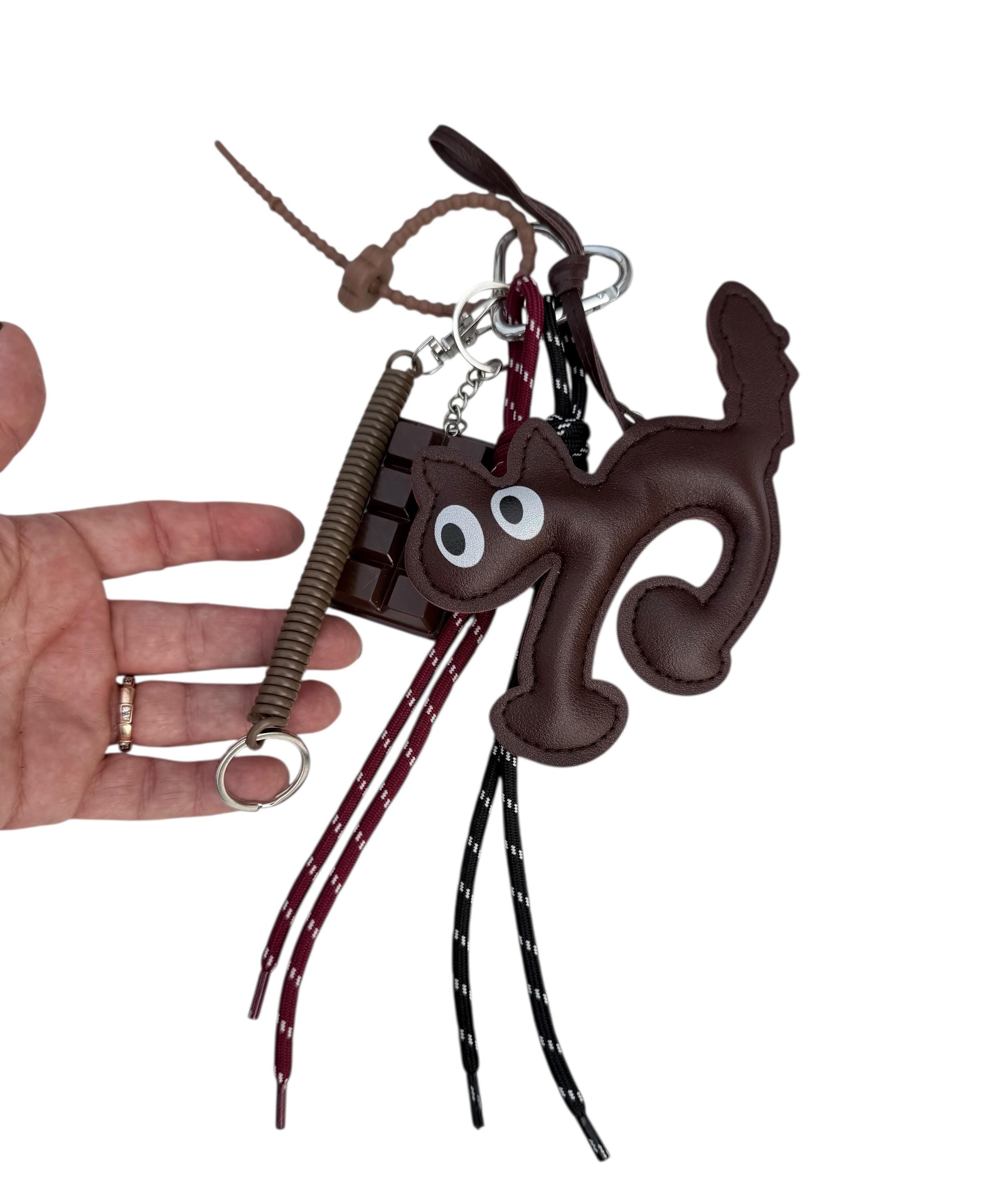 Charm de gato de cuero para bolsos –