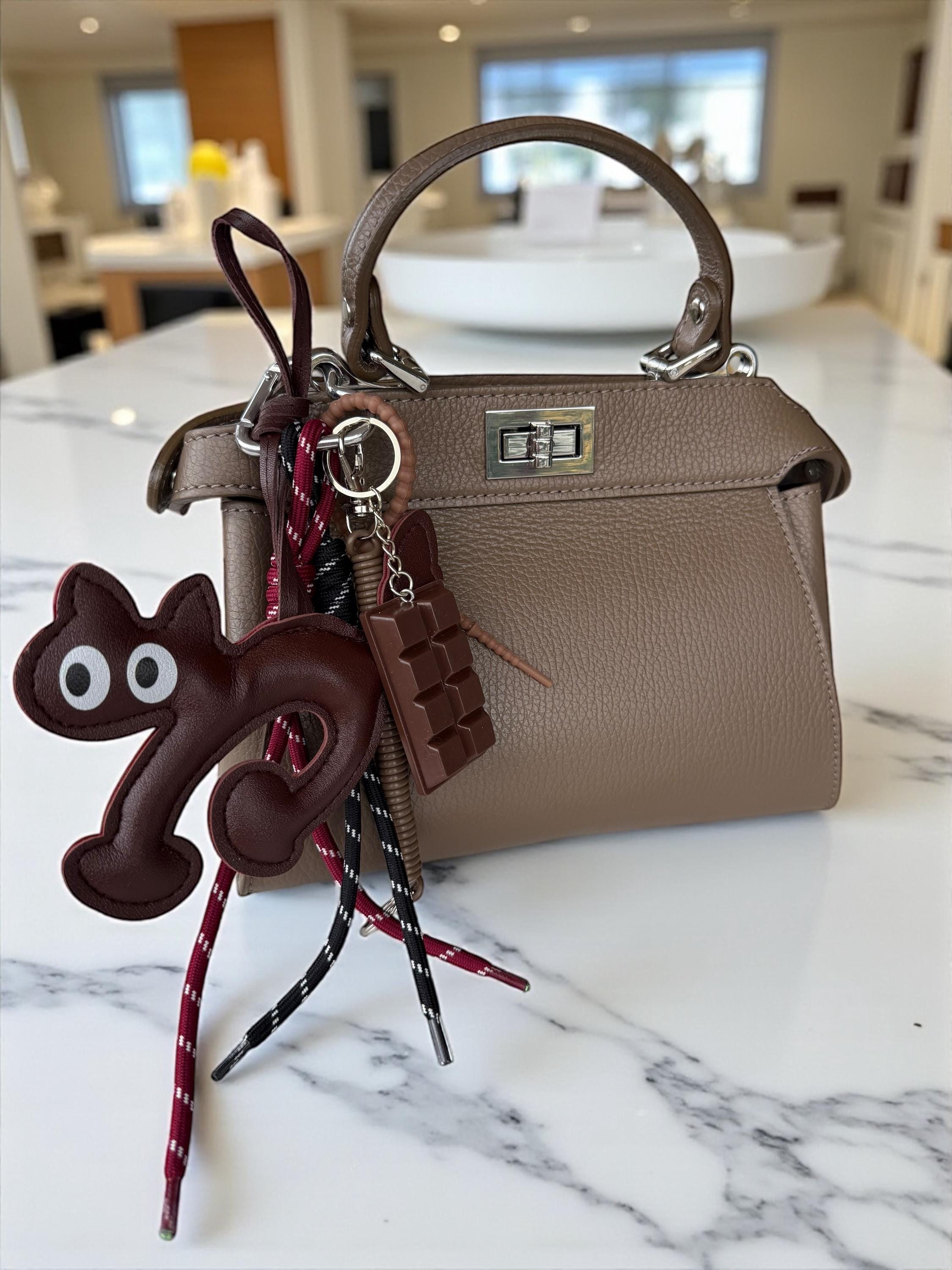 Charm de gato de cuero para bolsos –