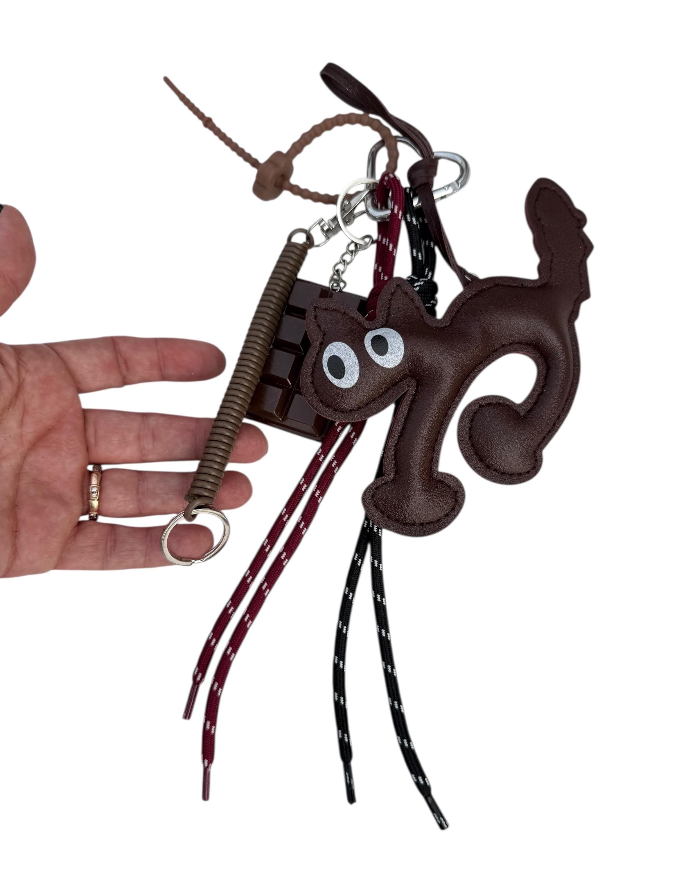 Charm de gato de cuero para bolsos –