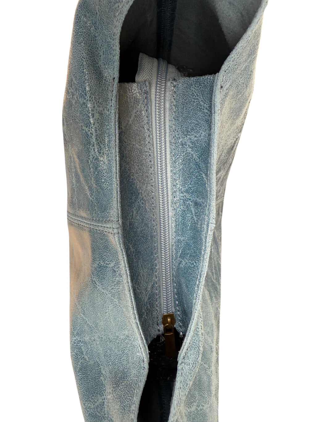 Bolso hobo boho de piel auténtica en tonos camel, marrón y azul.