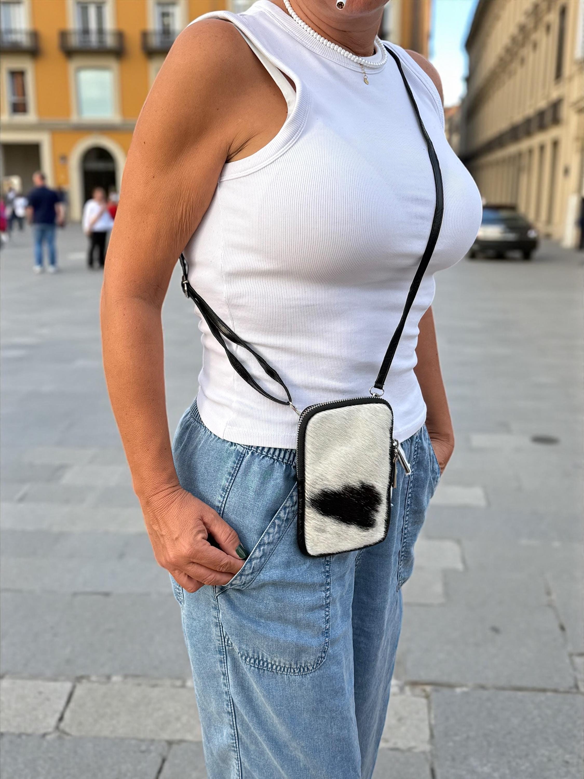 Bolsa para teléfono de piel auténtica con estampado de vaca