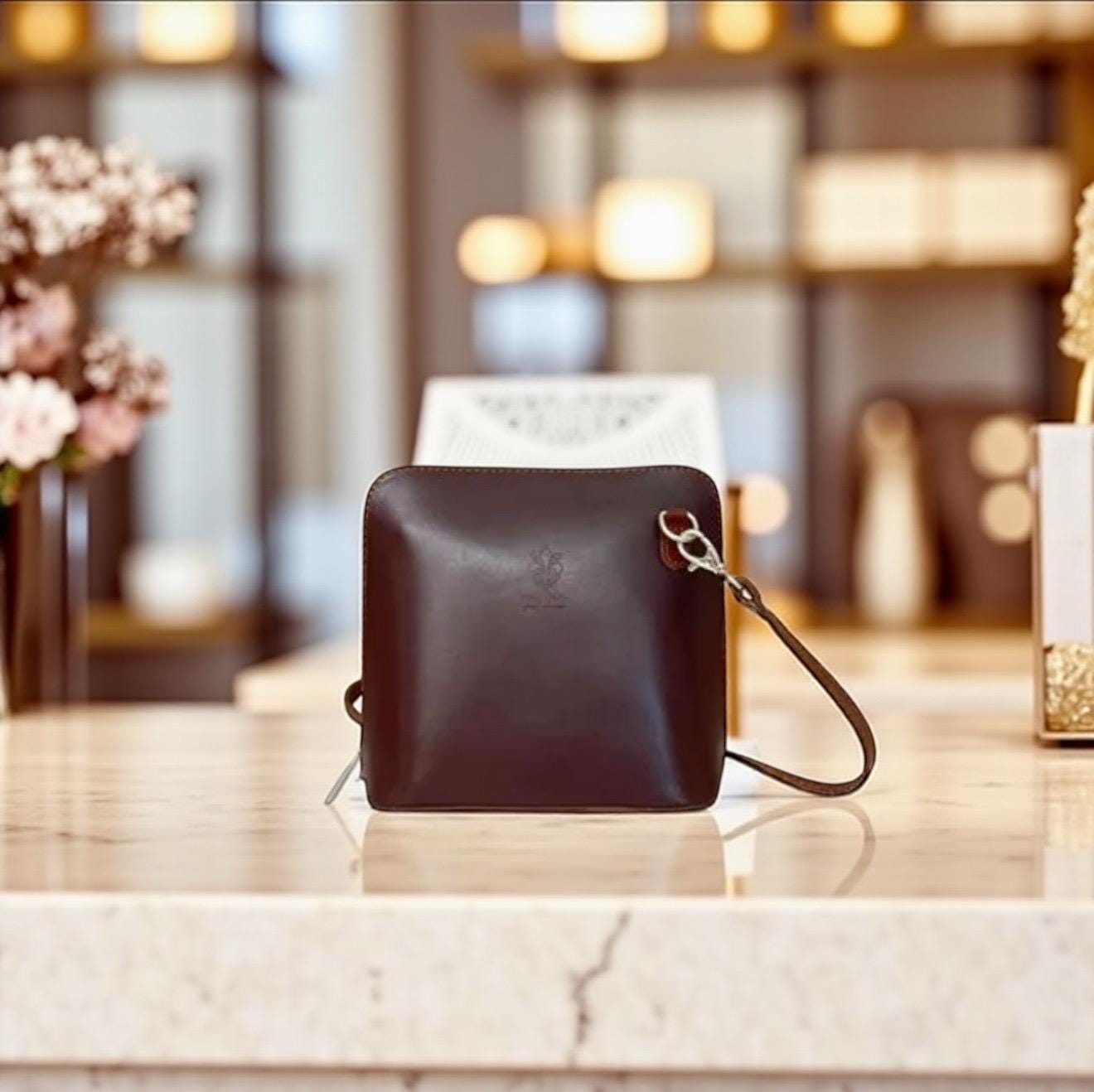 Mini bolso de piel estructurada en tonos tierra