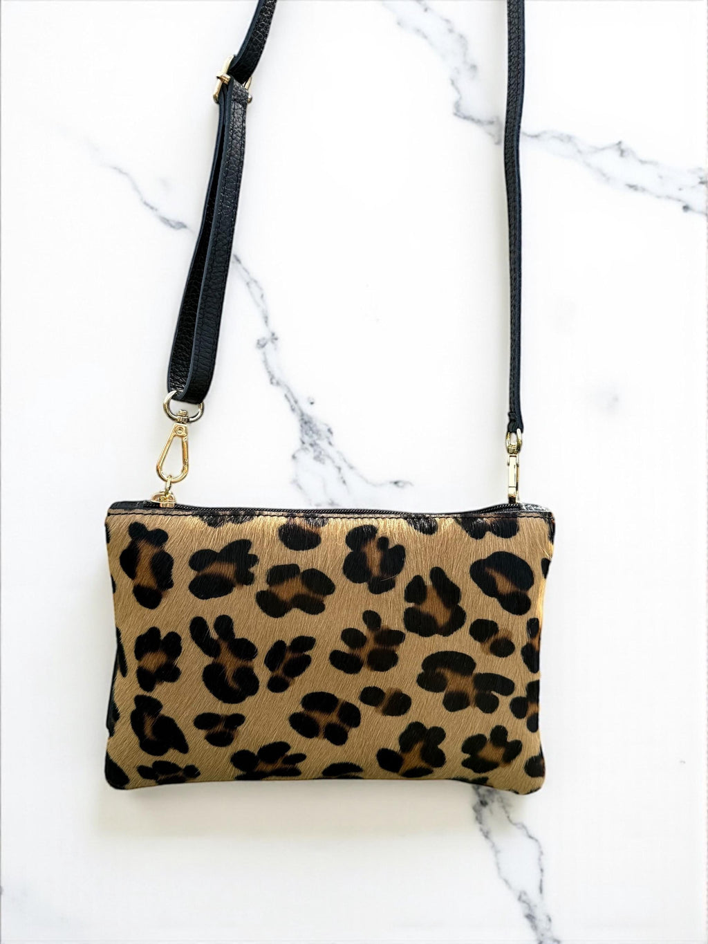 Bolso de mano de piel sintética con estampado de leopardo y pelo de poni, con borla