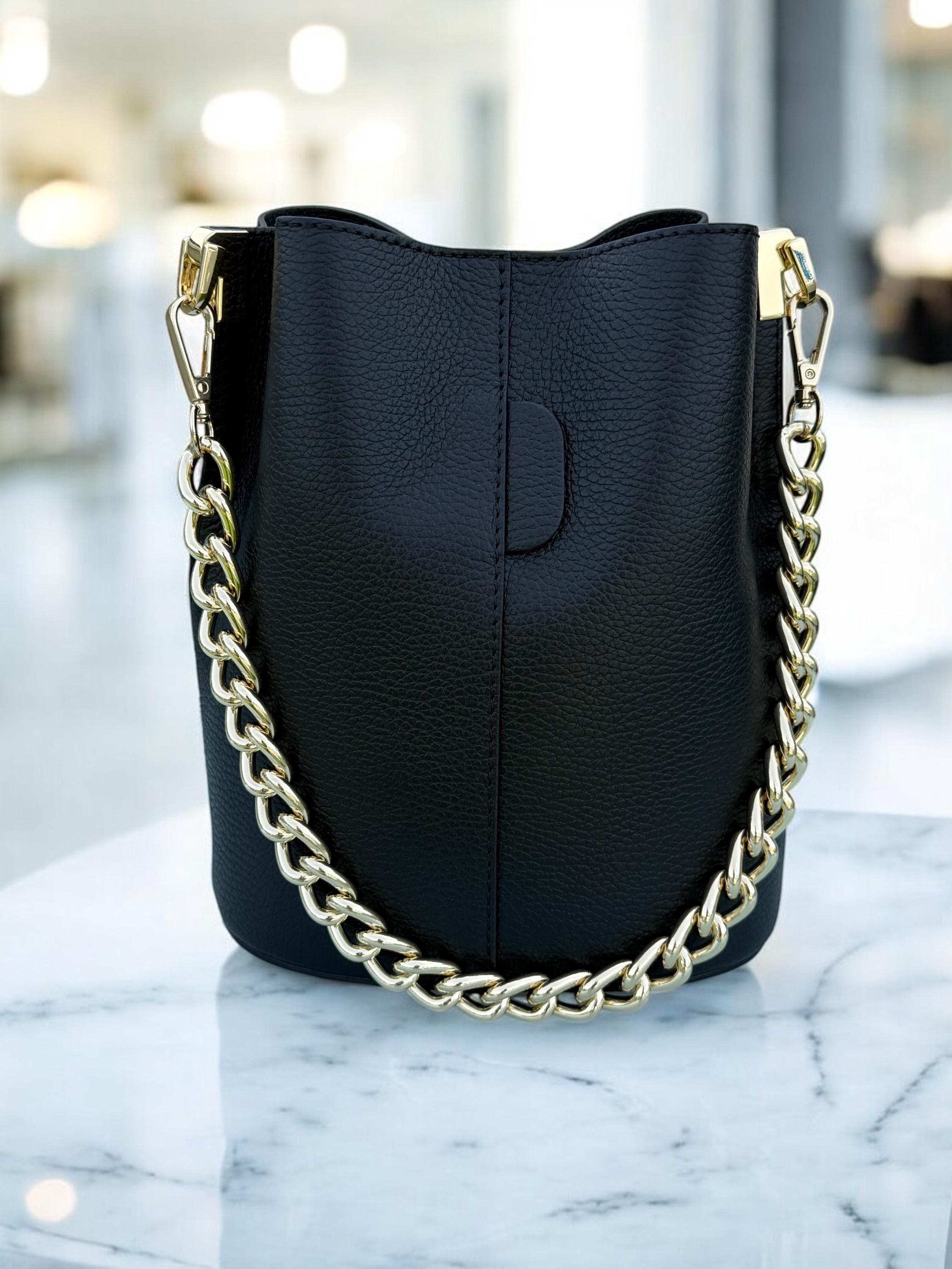 Bolso de cuero tipo bombonera