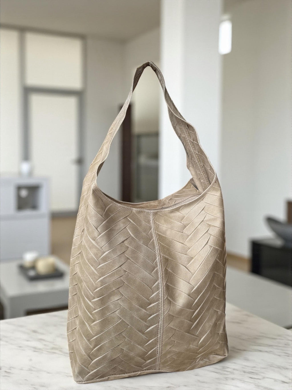 bolso hobo negro de piel auténtica con acolchado en espiga