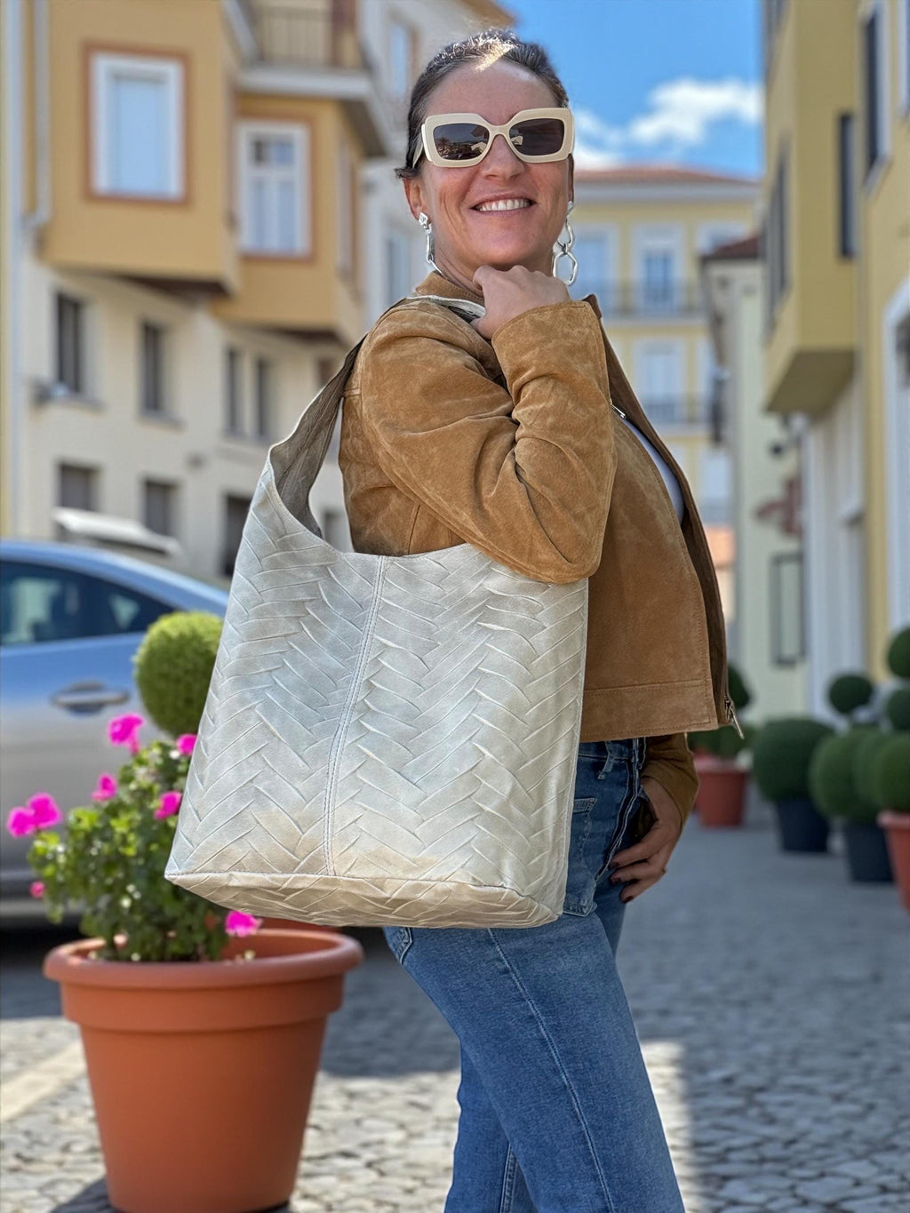 bolso hobo beige de piel auténtica con acolchado en espiga