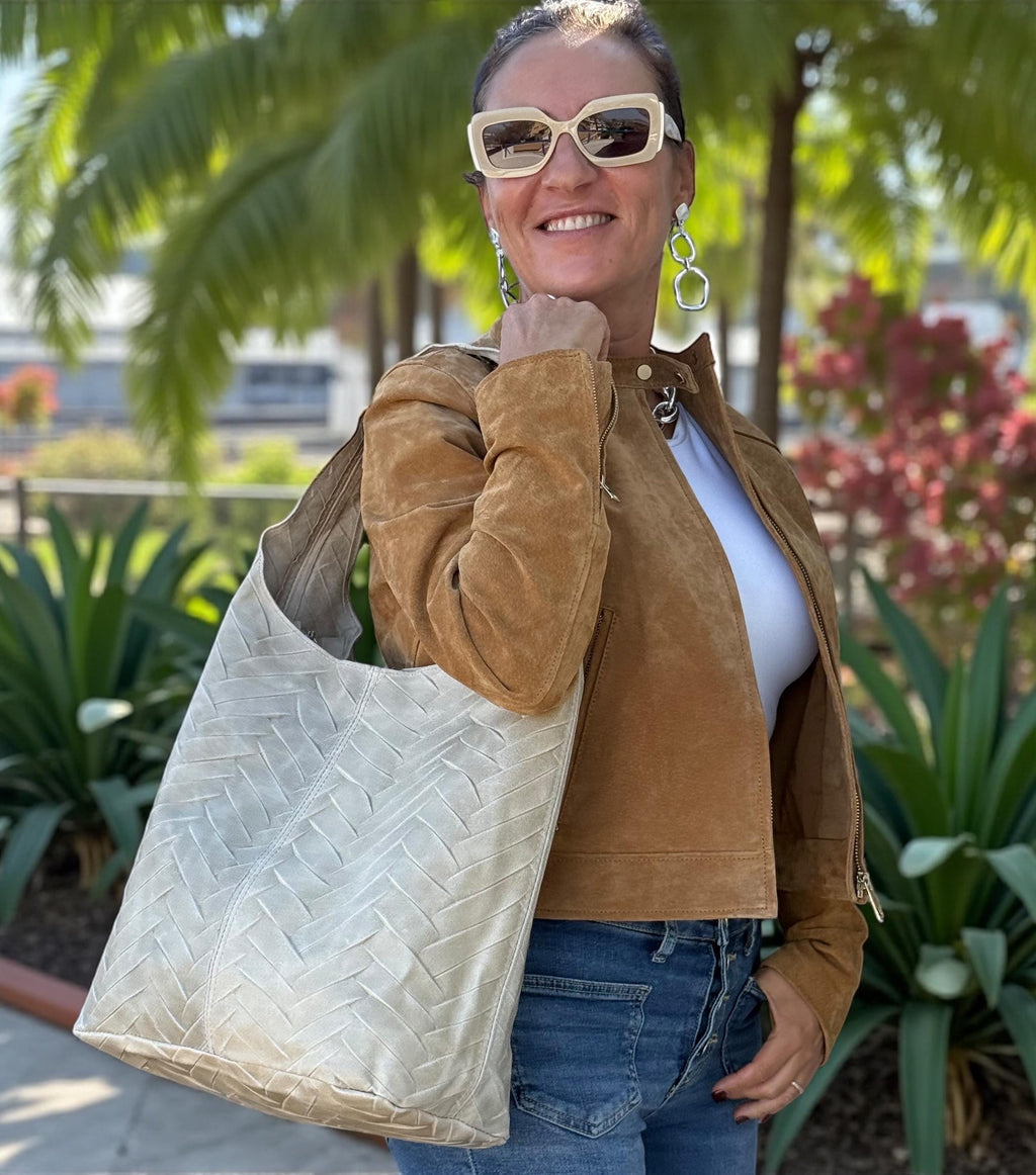 bolso hobo beige de piel auténtica con acolchado en espiga