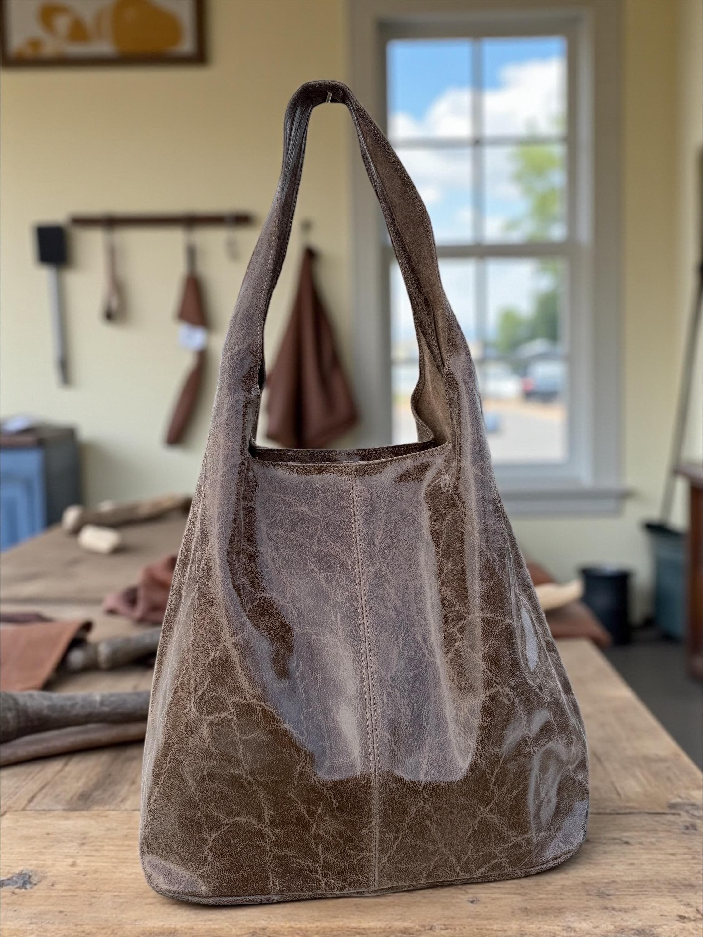 Bolso hobo holgado de piel auténtica marrón