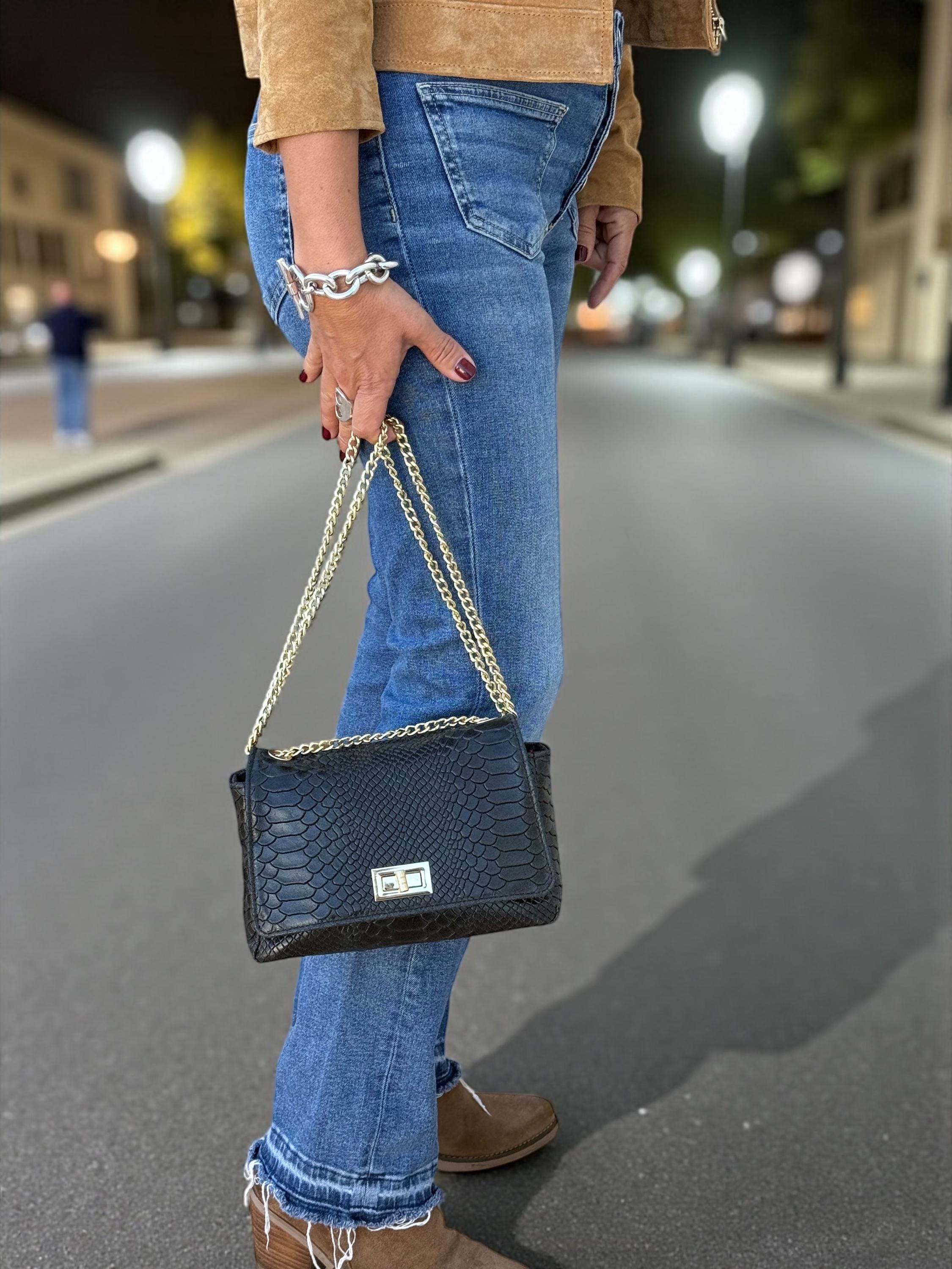 Bolso bandolera mini negro de piel auténtica repujada