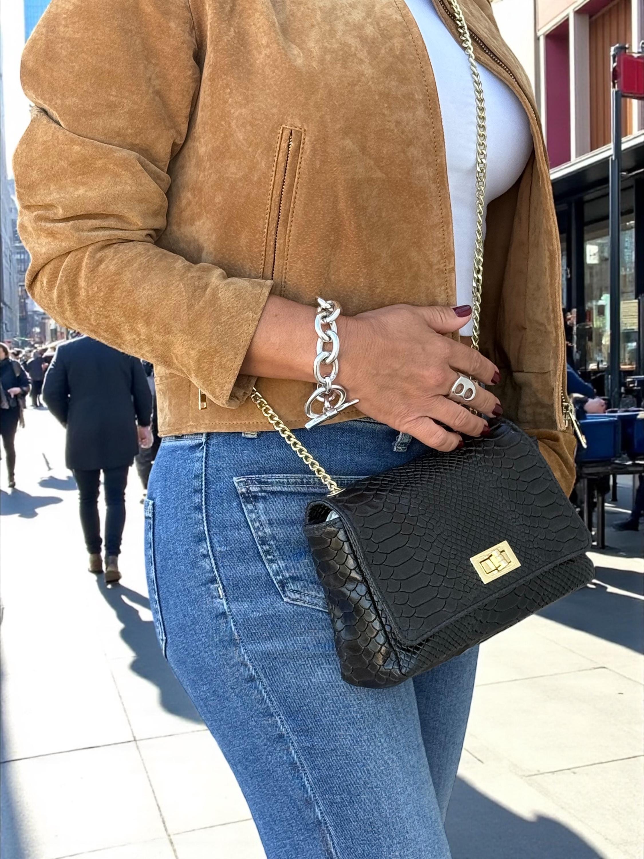 Bolso bandolera mini negro de piel auténtica repujada