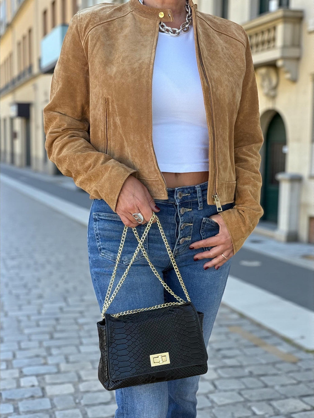 Bolso bandolera mini negro de piel auténtica repujada