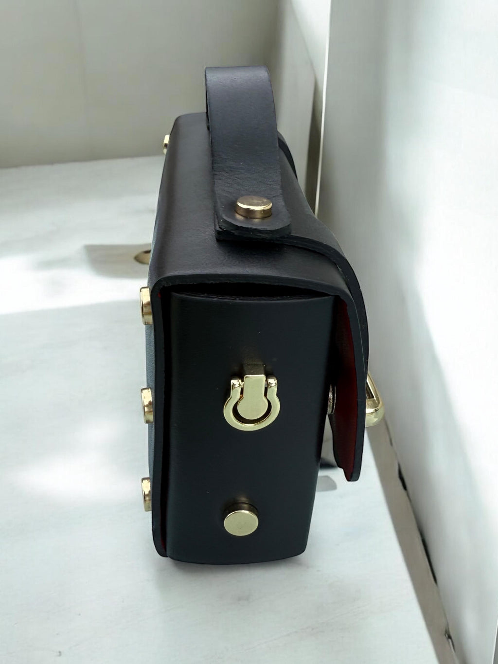 Bolso mini caja estructurado de piel